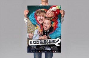 man-holding-poster-mockup-psd